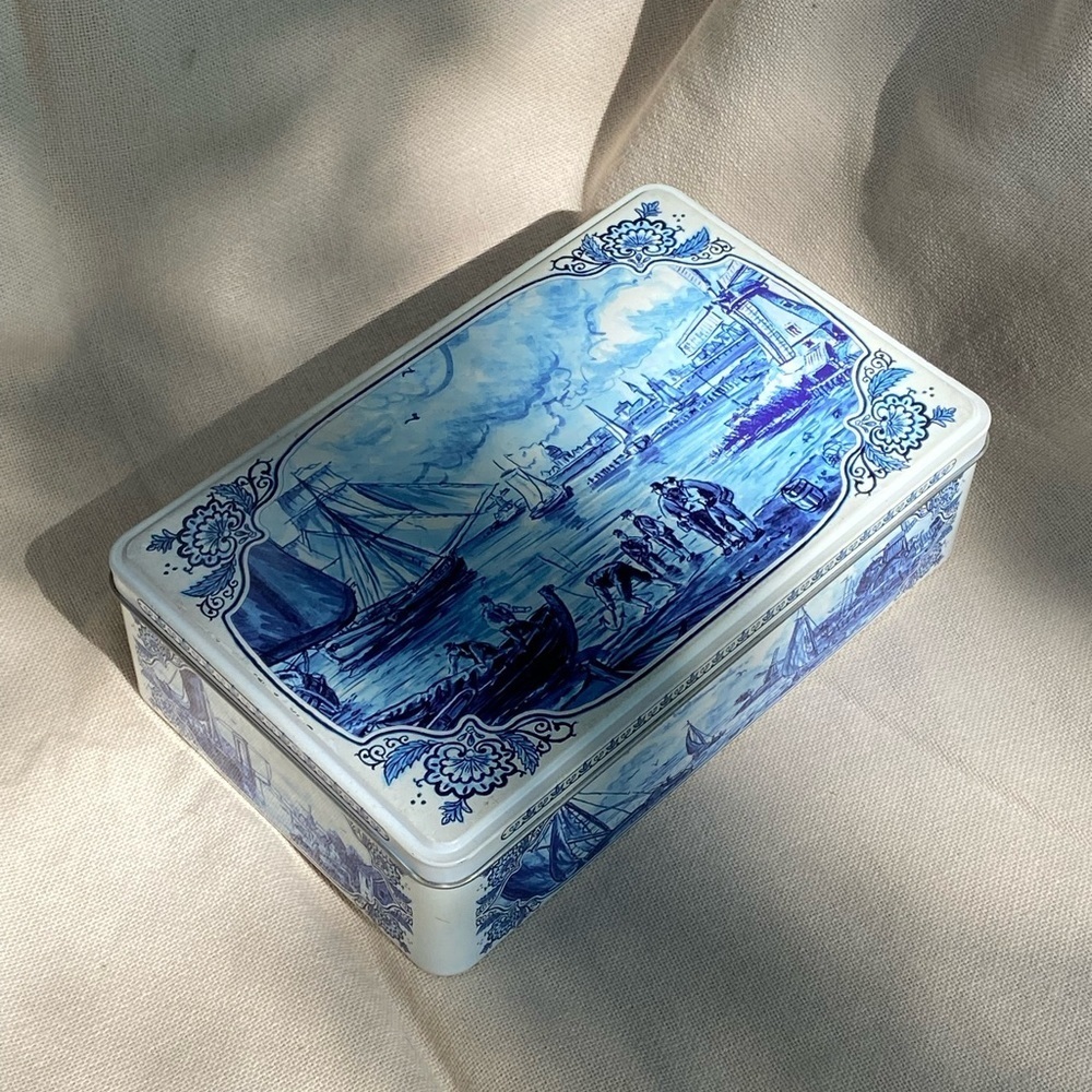 VINTAGE blue and white collectible tin box